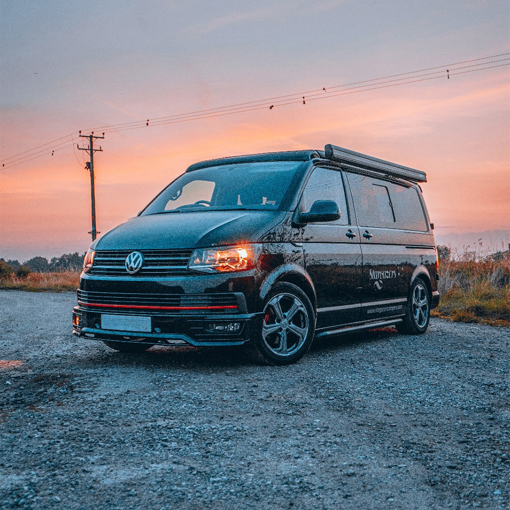 Stargazers A picture of a black campervan for hire